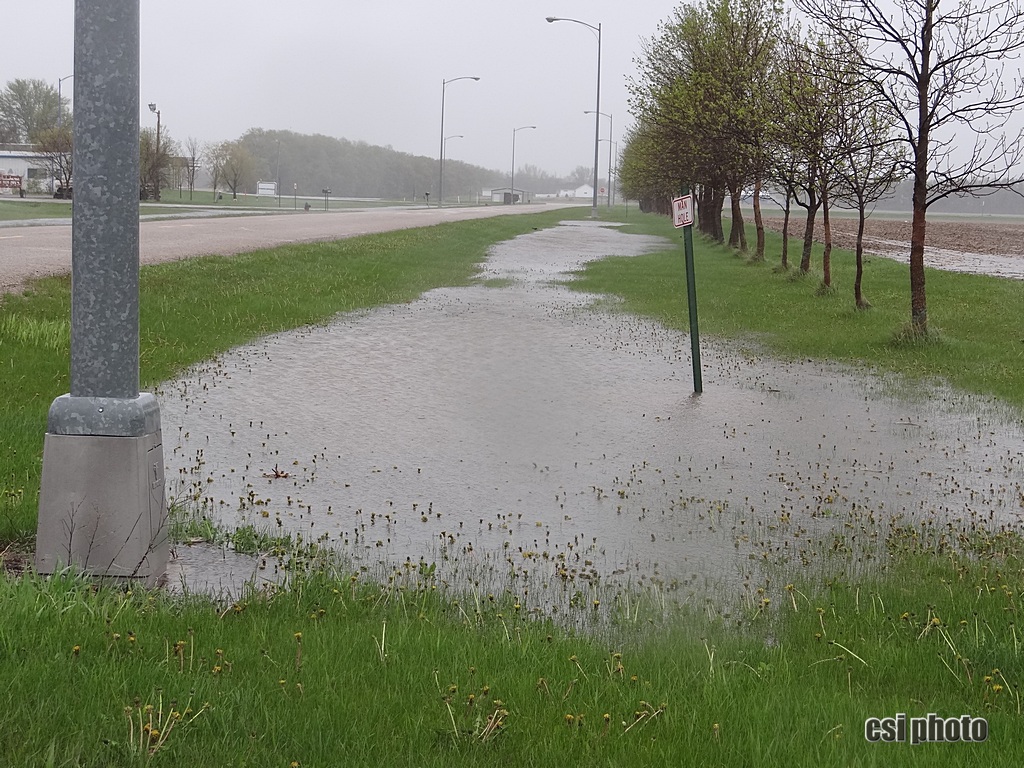 Water standing in ditch along entrance to Jamestown Regional Airport -  CSi photo